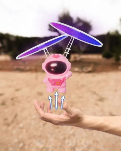 JUGUETE ASTRONAUTA VOLADOR ROSADO